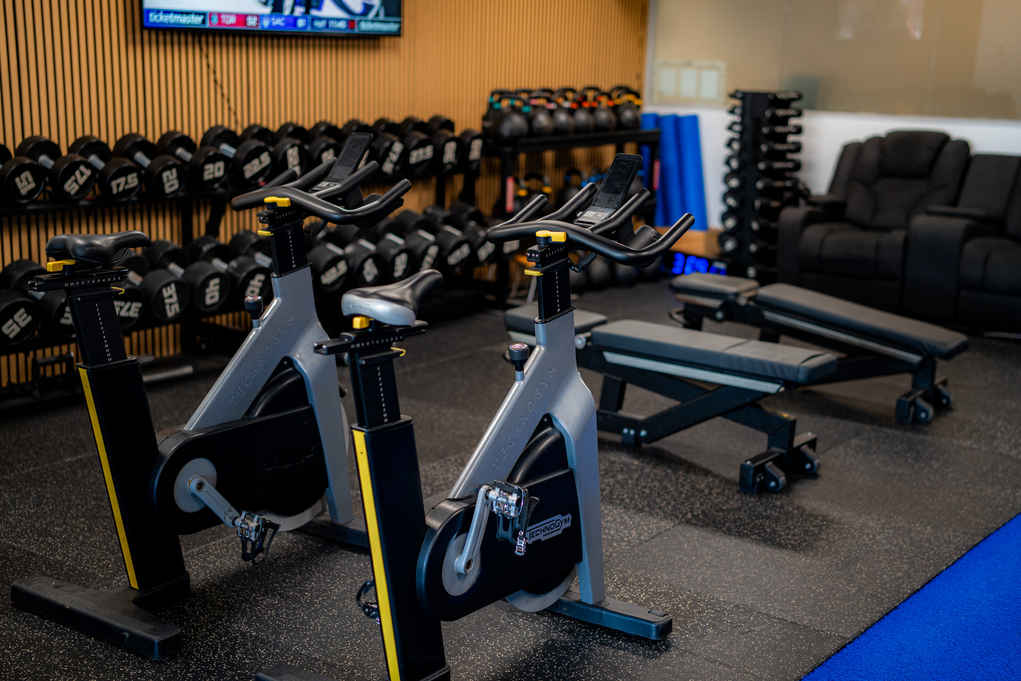 Cardio area and dumbbells at Trademark Performance